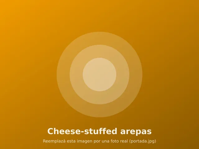 Golden arepas split open with melted cheese